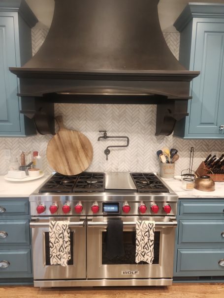 Kitchen cleaning of a residential home showing stove and countertops